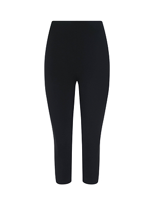 The Dee Capri Pant is a black, high-waisted, fitted legging made from stretch fabric. Displayed against a plain white background, its simple, full-length design features no visible logos, patterns, or embellishments.