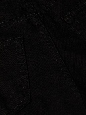 Close-up of the black denim fabric on the Lissania Jean Short, highlighting detailed stitching and the top corners of two back pockets for a tailored silhouette.