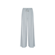 The Connie Drawstring Trouser features light gray, wide-leg pants with an elastic waistband and adjustable drawstring, offering designer style inspired by Paris Fashion Week on a plain white background.