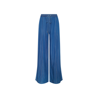 The Connie Drawstring Jean showcases wide-leg blue denim pants made from featherweight fabric, featuring an elastic waistband with a drawstring tie, presented against a plain white background.