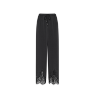 The Mirel Satin Lace Pant features a black satin finish, a drawstring waist, and delicate lace trim at the hem, showcased against a plain white background.