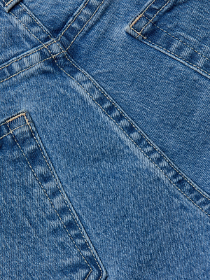 Close-up of blue stretch denim fabric with stitching details and two back pockets, featured on the River Jean Bermuda Short.