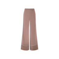 The Tavia Satin Trouser features a high-waisted, wide-leg silhouette in light brown satin, detailed with a subtle front crease and faint white trim near the hem, shown against a white background for an effortlessly chic look.