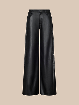 The Isolde Cargo Pant in black vegan leather features utility pockets, side pockets, a front button and zip closure, and a wide-leg silhouette, displayed on a plain beige background.