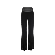 The Prudence Cummerbund Trouser is crafted from black velvet with a high waistband featuring horizontal pleat detailing. These flare pants showcase a smooth, sleek texture and a tuxedo-style finish, set against a plain white background.