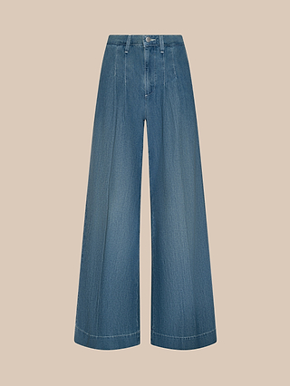 Jayani Pleated Wide-Leg Jean in blue features a high waist, visible front seams, and is crafted from non-stretch denim, displayed on a plain beige background.