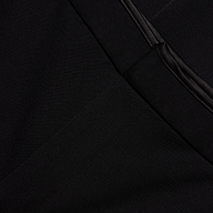 Close-up of slim-straight black Rebel Trouser featuring a pocket with a smooth, satin-look trim.