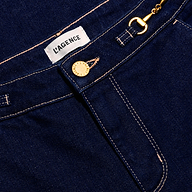 Close-up of Jules Wide-Leg Jean in dark wash, featuring a high-rise fit, gold-tone hardware, and contrast stitching.