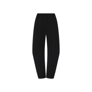 The Colby Barrel-Leg Trouser is a black high-waisted, straight-leg style with a tailored fit that captures the power suit aesthetic. With belt loops and minimal detailing, these high-rise trousers are shown against a plain white background.