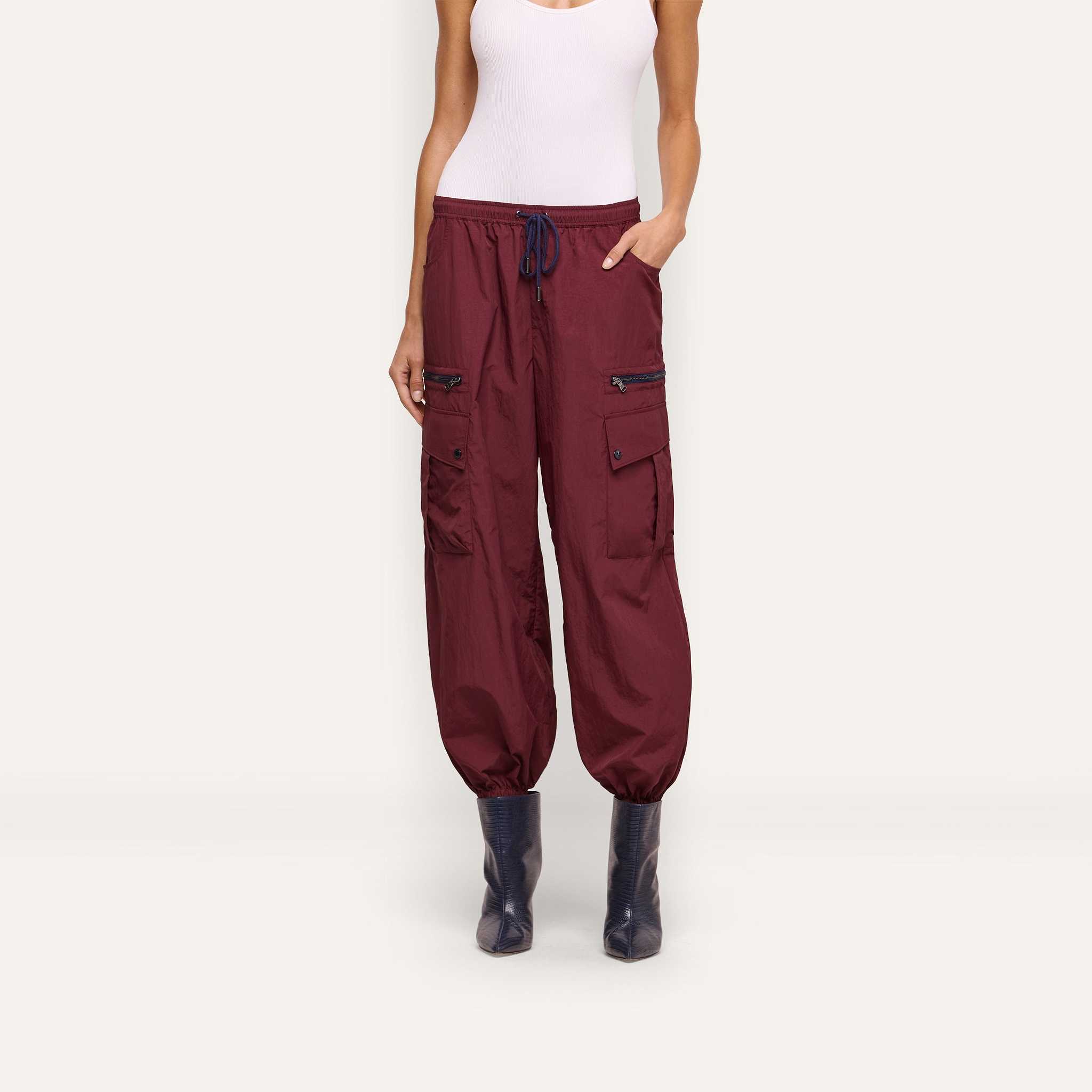 Monrose Nylon Jogger deep red water-repellant cargo joggers with utility pockets, a drawstring waist, and cinched cuffs.
