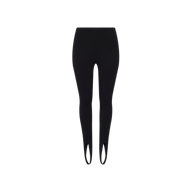 Black high-rise Enid Stirrup Legging in scuba knit with stirrups at the ankles.