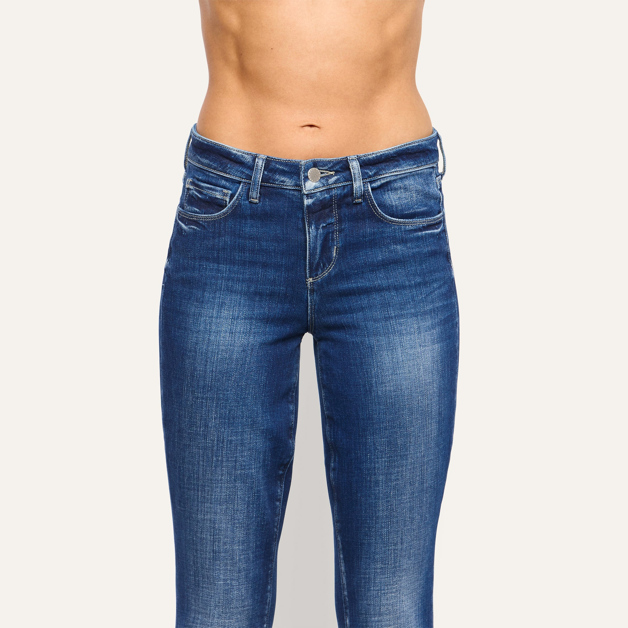 Kezia Bootcut Jean in mid-rise, low-rise stretch denim with a dark wash.