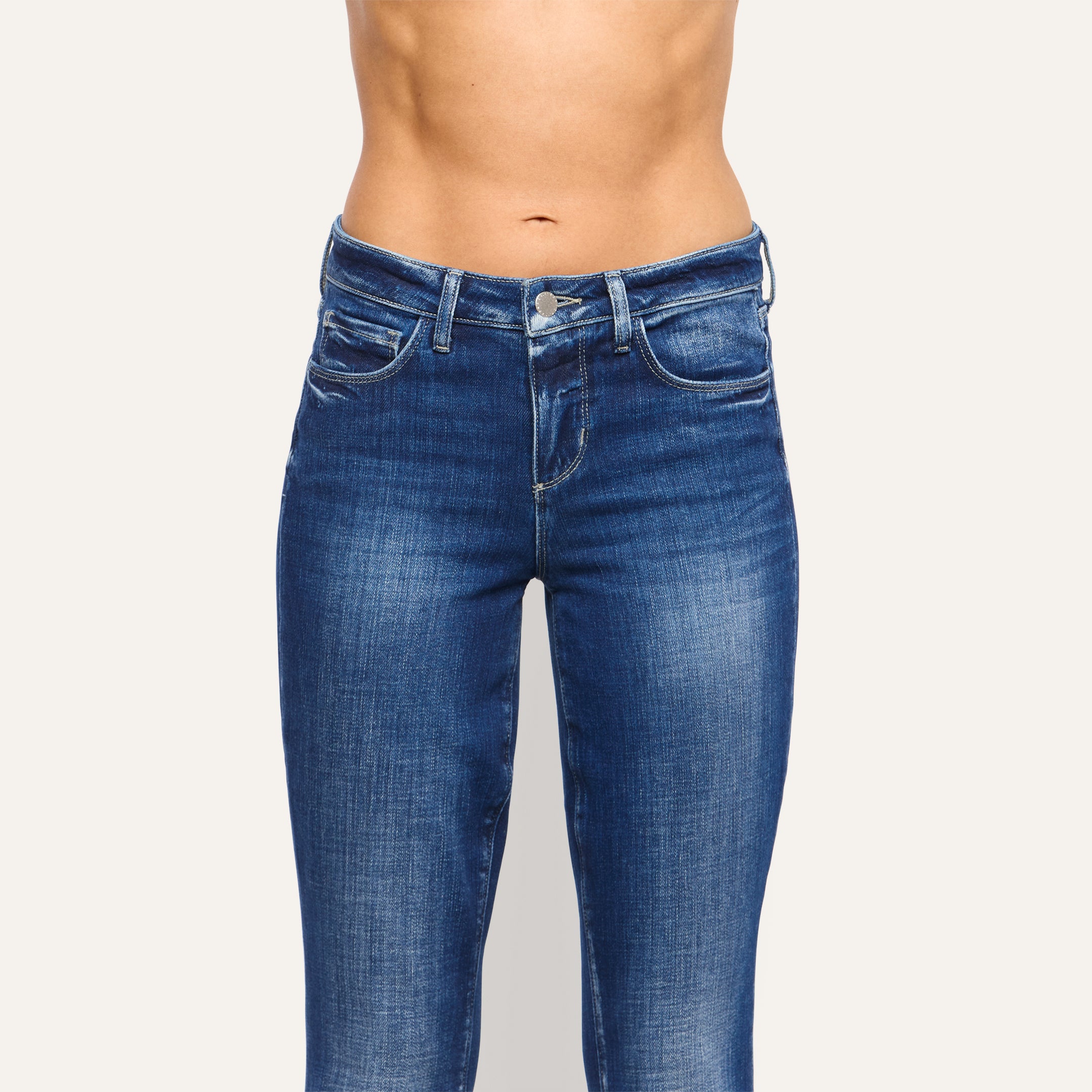 Kezia Bootcut Jean in mid-rise, low-rise stretch denim with a dark wash.