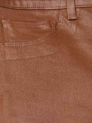 Close-up of the front pocket and waistband of the Margot Coated Cropped Skinny Jean in brown, highlighting stitching details and a belt loop.