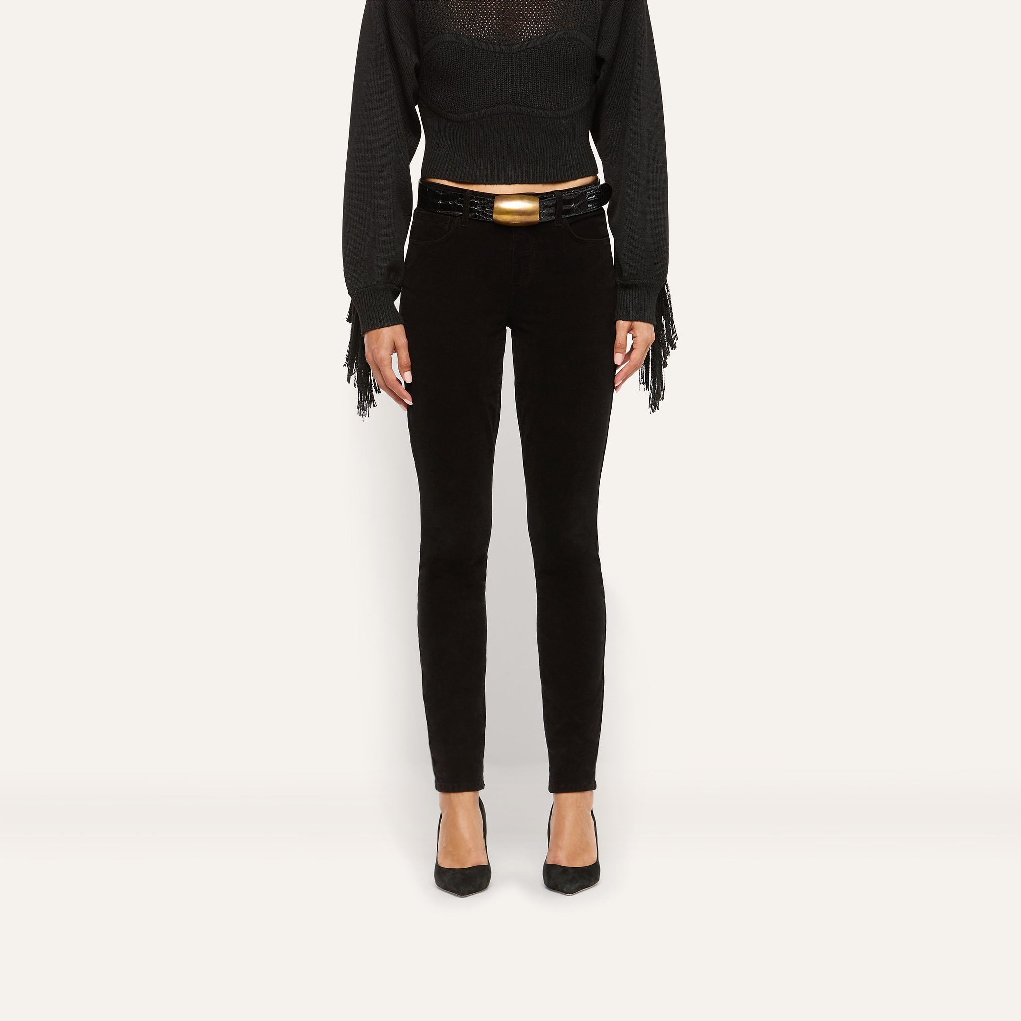 Marguerite Corduroy Skinny Pant in black, featuring a high-rise skinny fit and a black belt with a gold buckle.