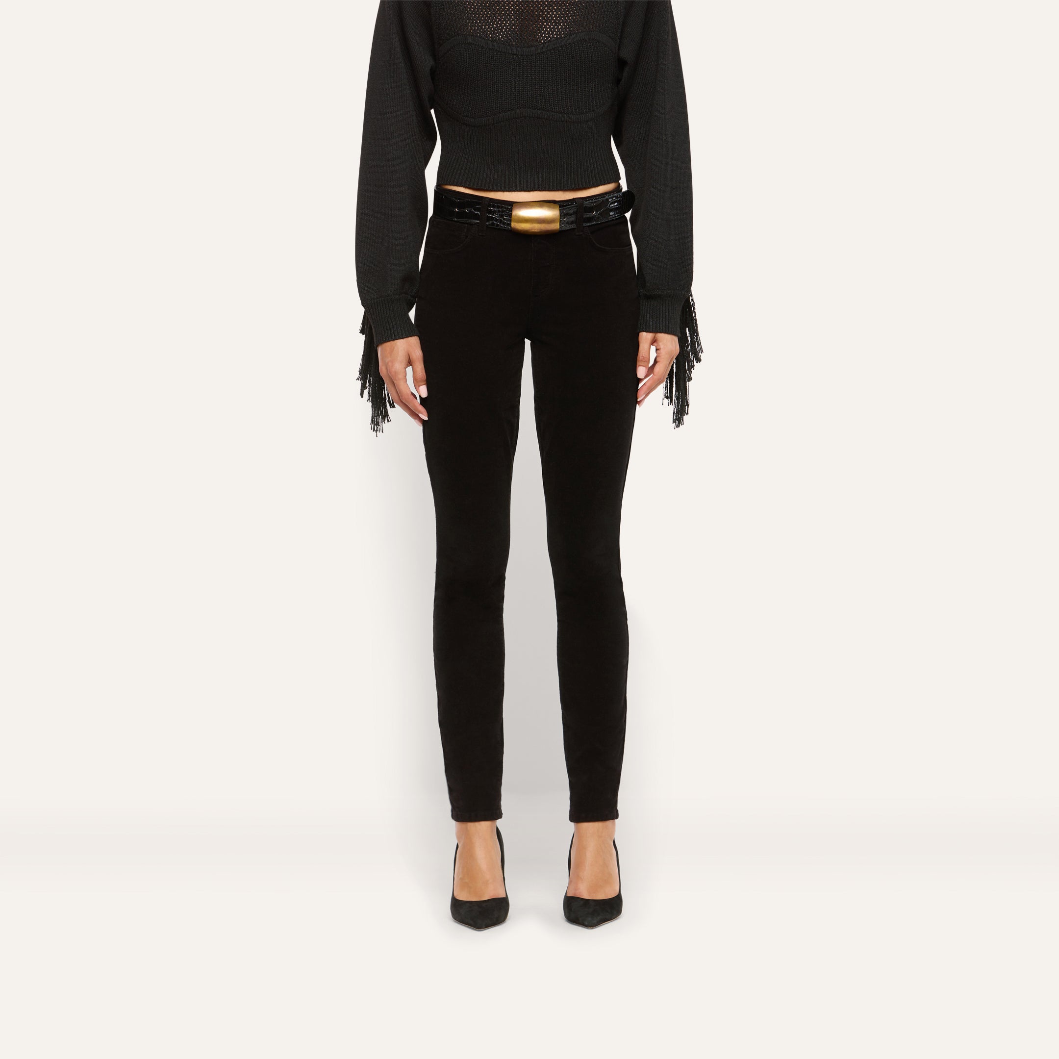 Marguerite Corduroy Skinny Pant in black, featuring a high-rise skinny fit and a black belt with a gold buckle.