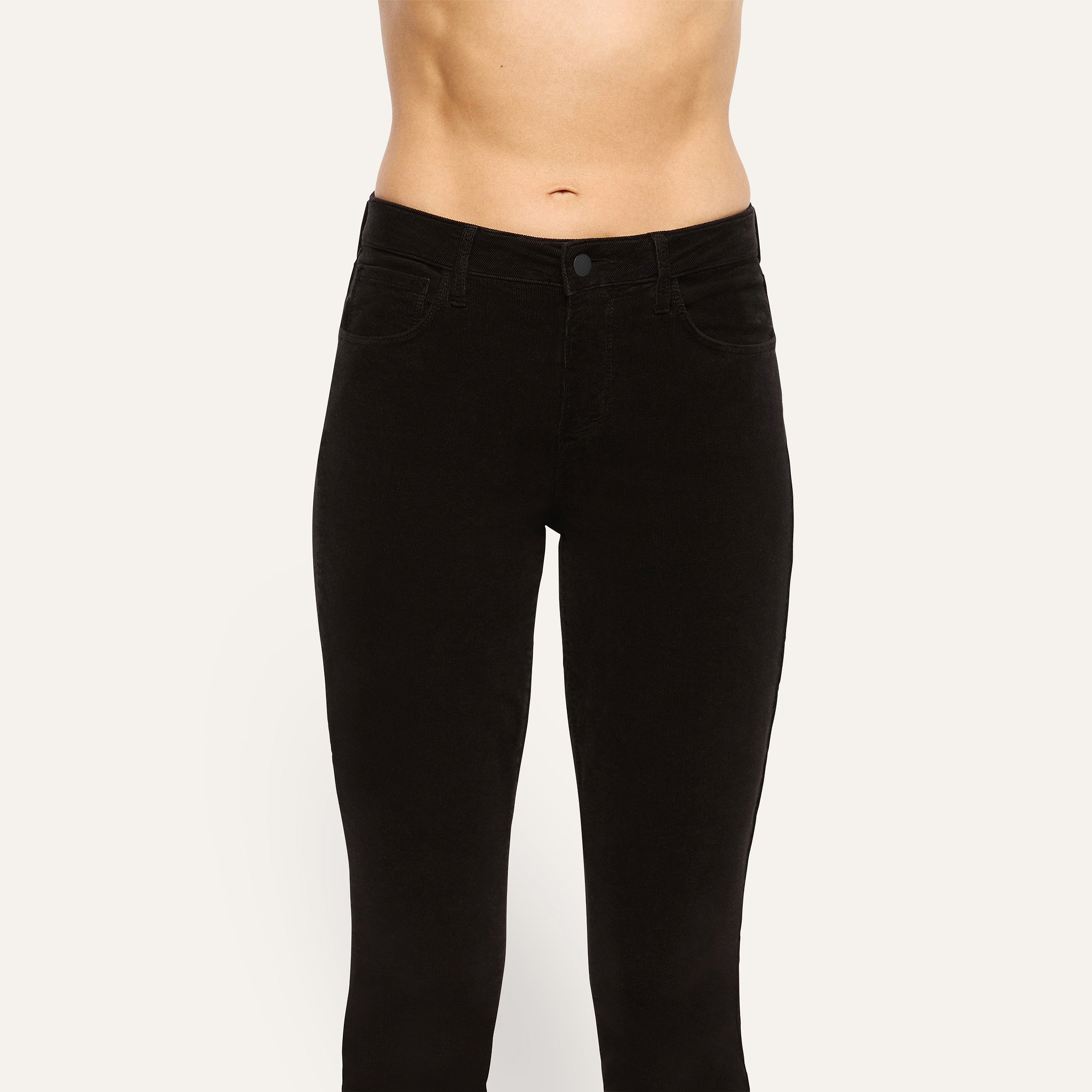 Marguerite Corduroy Skinny Pant in black, featuring a high-rise skinny-fit design with a button closure and front pockets.