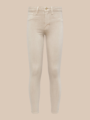 Marguerite Skinny Jean in beige, made with high-recovery fabric. Features a 30-inch inseam, button and zipper closure, front and back pockets, and belt loops. Shown against a plain light beige background.