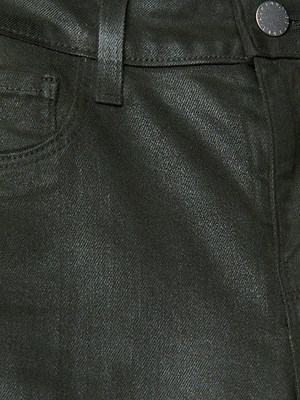 Close-up of the L’AGENCE Marguerite Coated Skinny Jean, featuring a black coated finish with visible waistband, belt loop, front pocket, and metal button. The texture and stitching of this leather-like fabric stand out.