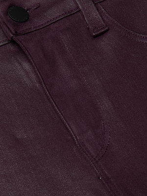 Close-up of the L'AGENCE Marguerite Coated Skinny Jean in dark purple, highlighting the waistband, button, belt loop, and front pocket outline.