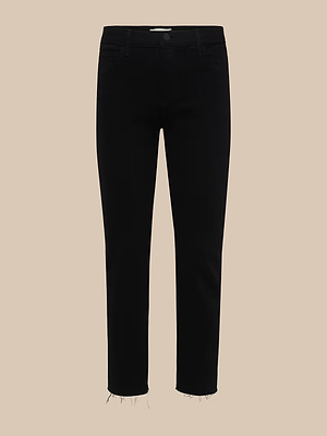 The Sada Slim-Leg Cropped Jean features black stretch denim, a slim fit, high-rise waist, button and zipper closure, front and back pockets, and raw frayed hems at the ankles, shown on a plain beige background.