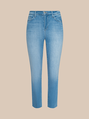 The Sada Cropped Slim-Leg Jean in light blue features a high-waisted, slim-leg fit with a button and zip closure, light wash, and cropped length, displayed against a beige background.