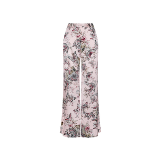 The Pilar Silk Wide-Leg Pant is a high-rise, wide-leg silk pant with a light pink background, adorned with a colorful floral and butterfly print, shown against a plain white backdrop.
