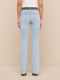 A person is shown from the back, modeling the Ruth Straight-Leg Jean in light blue, featuring back pockets and a contrasting waistband, styled with heeled shoes against a plain white background.