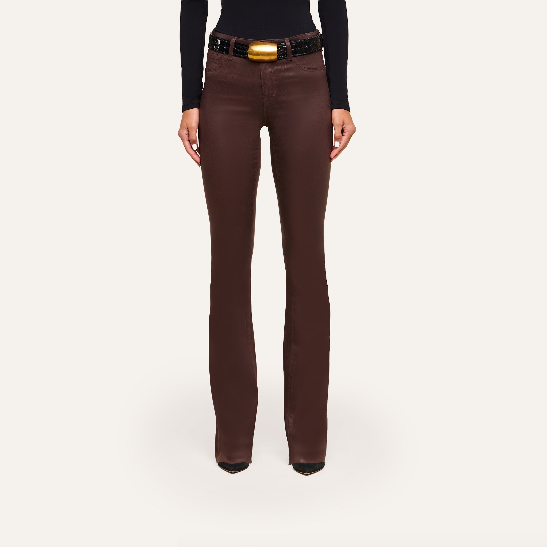 Ruth Coated Straight-Leg Jean in dark brown, featuring a high-rise, straight-leg fit and a black belt with a gold buckle.