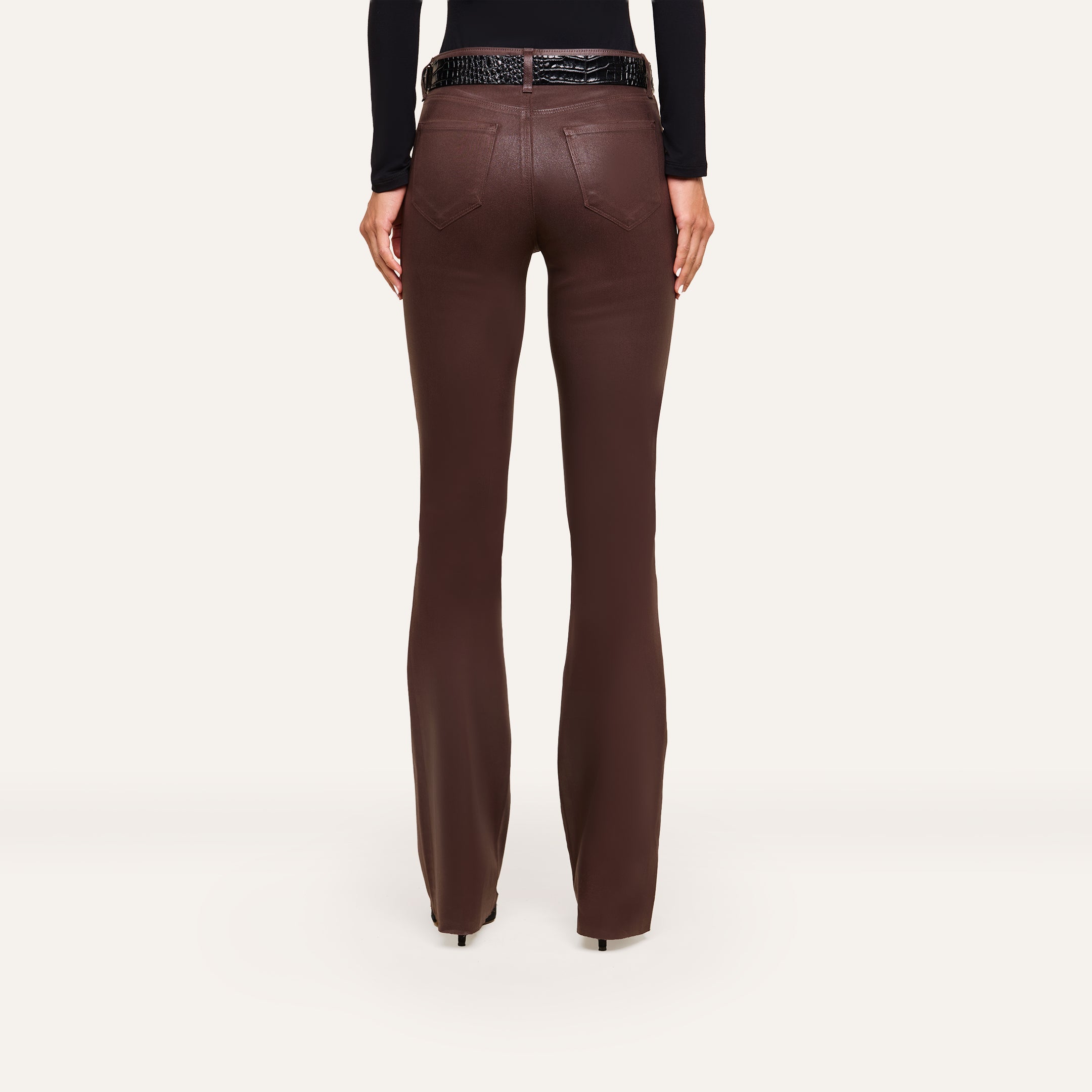 Rear view of Ruth Coated Straight-Leg Jean in dark brown, high-rise straight-leg coated stretch denim, styled with a black textured belt.