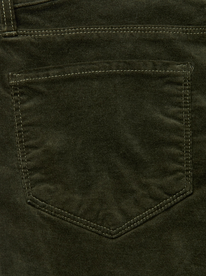 Close-up of L'AGENCE Stevie Velvet Jean in olive green, with visible stitching and a single back pocket, crafted from soft velvet in a straight leg silhouette.