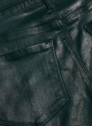 Close-up of the Selma Coated Bootcut Jean in dark green, highlighting the pocket, stitching, and coated denim texture.