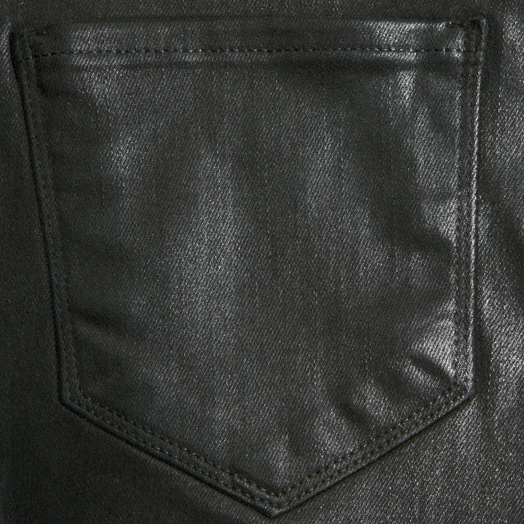 Close-up of the Kendra Coated Cropped Flare Jean in black, highlighting the denims coated finish and a single back pocket with visible stitching.