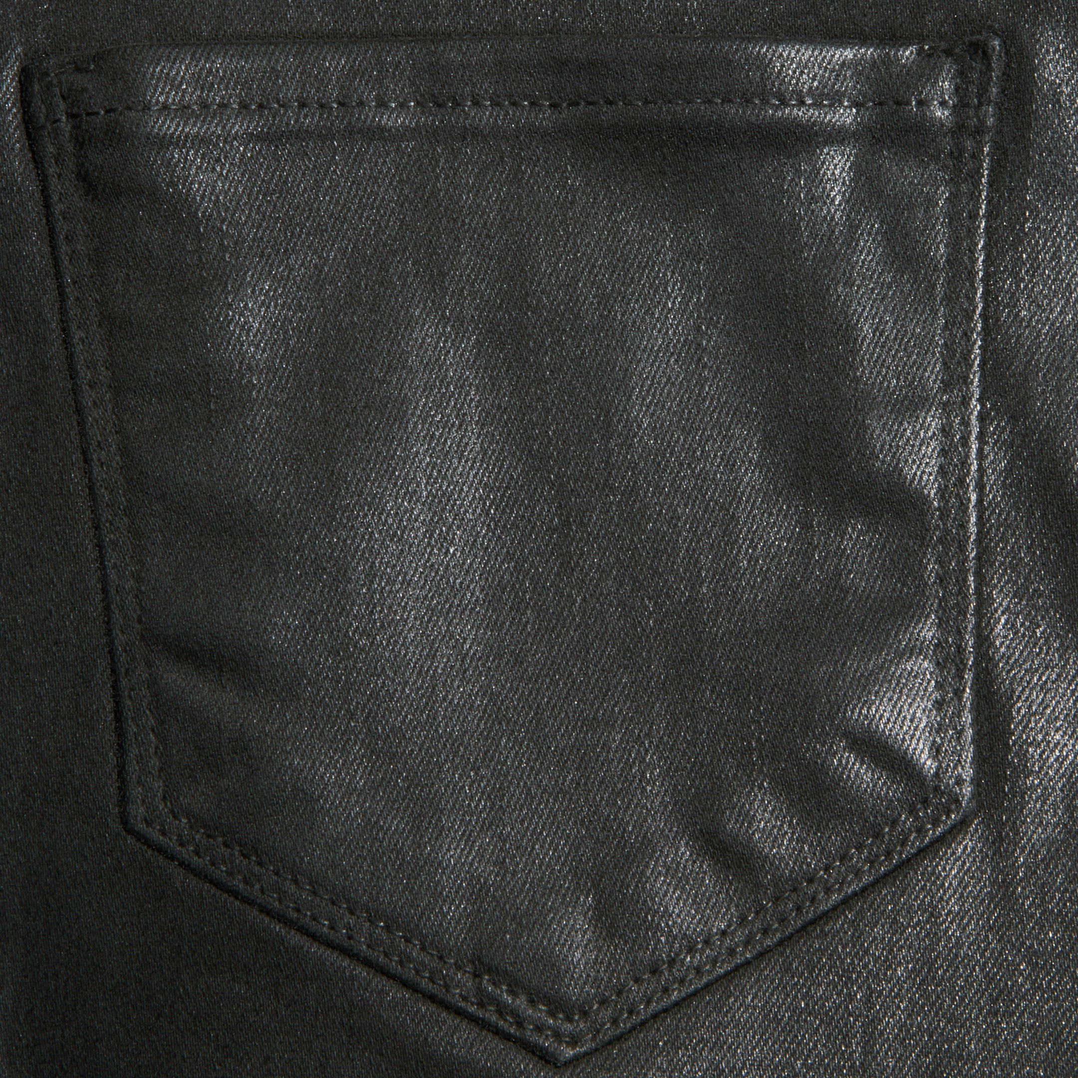 Close-up of the Kendra Coated Cropped Flare Jean in black, highlighting the denims coated finish and a single back pocket with visible stitching.