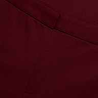 Close-up of the waistband and fly of the deep red stretch twill Rebel Trouser in a slim-straight fit.