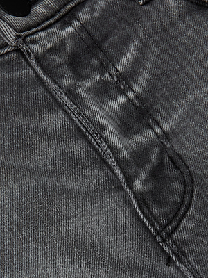Close-up of the front pocket and waistband of the Clayton Wide-Leg Jean in high-rise black or dark gray stretch denim, highlighting detailed stitching, fabric texture, and a metal button.