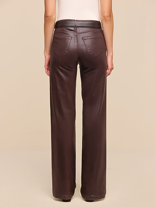 A person is seen from the back wearing the Clayton Coated Wide-Leg Jean in high-waisted, dark brown coated denim with two back pockets, set against a plain beige background.
