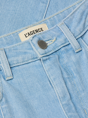 Light blue denim fabric with 'L'AGENCE' label