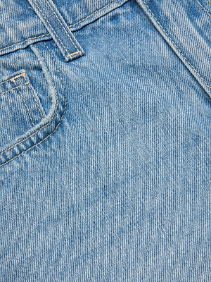 Close-up of the Clark Distressed Jean Short in light wash denim, featuring textured fabric, front pocket, waistband with belt loop, and raw hem detail.