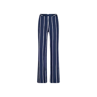 The Livvy Trouser features a chic navy blue design with vertical white pinstripes, crafted from lightweight tencel. With a fitted waist and front zipper, these flared pants perfectly merge comfort and style, as displayed against a plain white background.