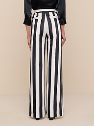 A person is wearing the Livvy Satin Straight-Leg Trouser and a black long-sleeve top, standing against a plain white background, viewed from the back.