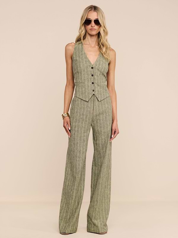 A woman wearing sunglasses, a sleeveless pinstriped vest, and the Livvy Linen-Blend Trouser stands against a plain white background.