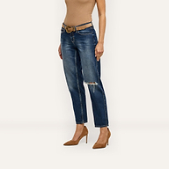 Nevia Slouchy Straight-Leg Jeans in an indigo wash with a distressed knee, worn with a tan belt and brown suede pumps.