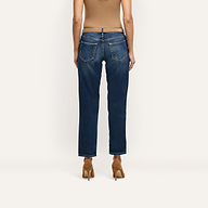 Back view of Nevia Slouchy Straight-Leg Jean in an indigo wash, styled with a tan belt and brown stiletto heels.