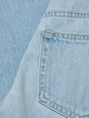 Close-up of the Nevia Slouchy Straight-Leg Jean in light blue, showing vintage-inspired denim with a back pocket, visible stitching, and a diagonal seam—ideal for your off-duty look.