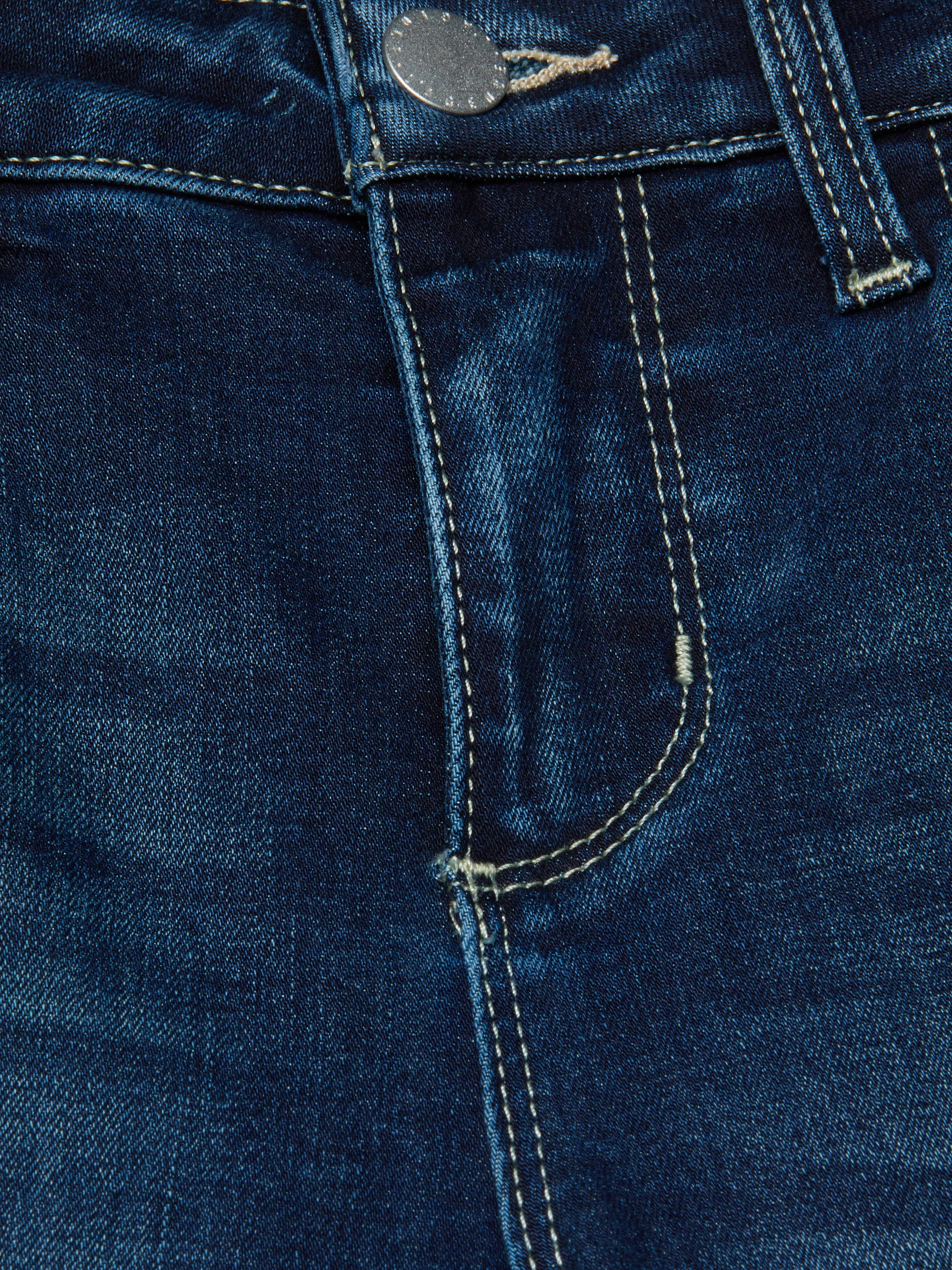 Close-up of the Sneeki Low-Rise Straight-Leg Jean in dark wash blue denim, highlighting the waistband, button, front pocket, belt loop, and yellow stitching.