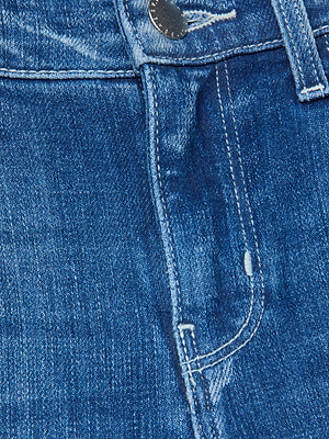 Close-up of the Sneeki Low-Rise Straight-Leg Jean by L'AGENCE, showcasing vintage medium-wash stretch denim with a low-rise waistband, button, zipper, front pocket, visible stitching, and faded texture.