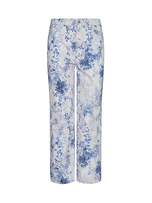 June Cropped Stovepipe Jean features a white floral print, high-rise straight leg, front button and zipper closure, and side pockets. Shown against a plain white background.