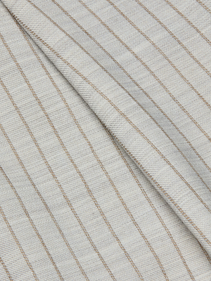 Close-up of the Allanah Pinstriped Trouser's light beige fabric, featuring thin brown vertical stripes and a soft, slightly textured feel. A diagonal fold is visible across the center, highlighting its classic suiting style.