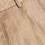 Close-up of the Allanah Linen-Blend Trouser in latte brown, featuring a visible seam and belt loop, showcasing the textured linen-blend fabric and its subtle sheen.